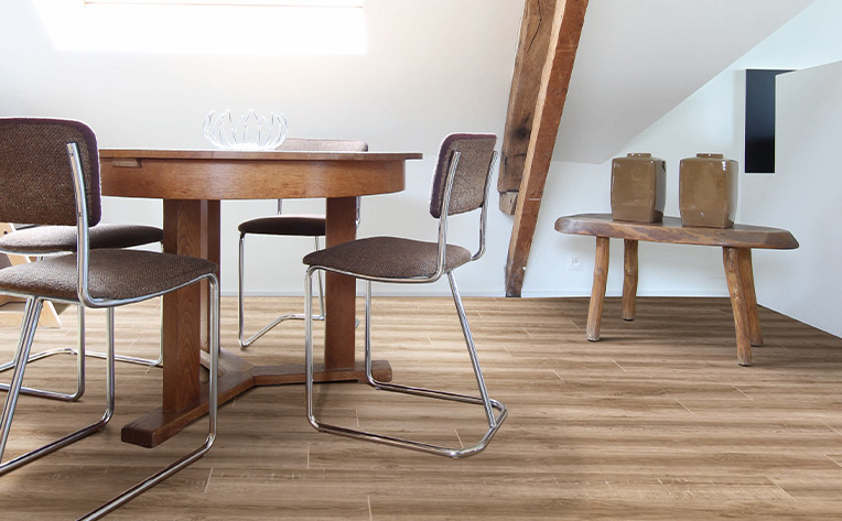 hardwood flooring with chairs and white walls