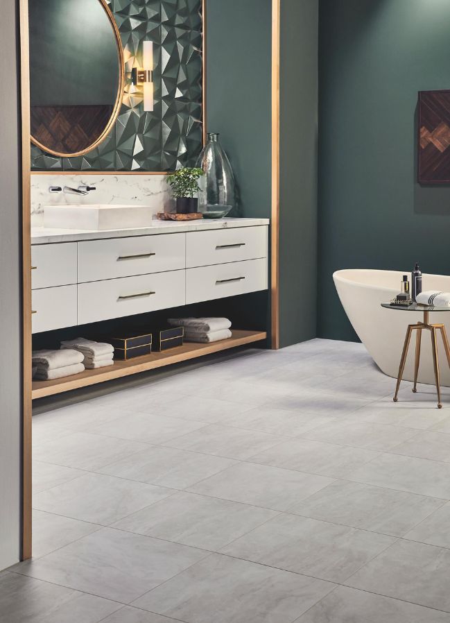 luxury vinyl tile flooring in a modern bathroom with green walls